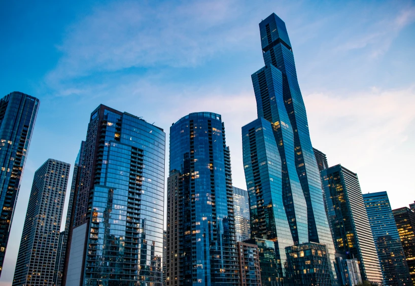Modern skyscrapers against a blue sky.
